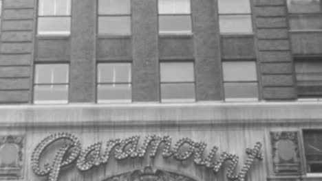 Vintage-Marquee-Sign-of-Paramount-Theater-Featuring-Performers-in-20th-Century