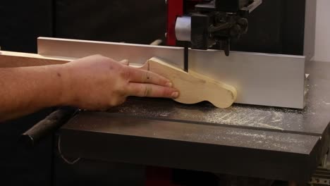 Luthier-working-on-guitar-neck