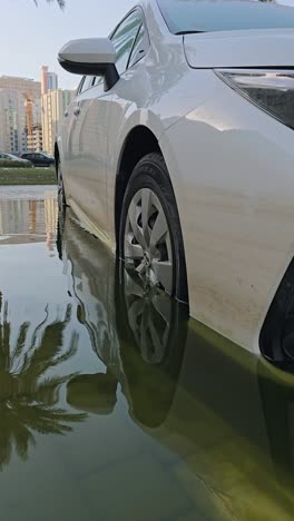 A-vehicle-submerged-in-floodwaters-post-record-rainfall-in-the-UAE-on-April-2024