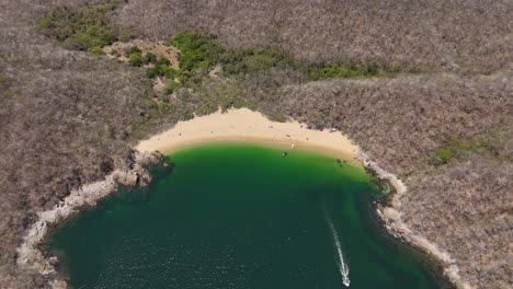 Organo-Bay,-situated-in-Huatulco-National-Park,-represents-an-unspoiled-coastal-in-Oaxaca,-Mexico