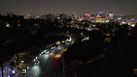 Vista-Nocturna-De-Hollywood-California---Ciudad-Oscura
