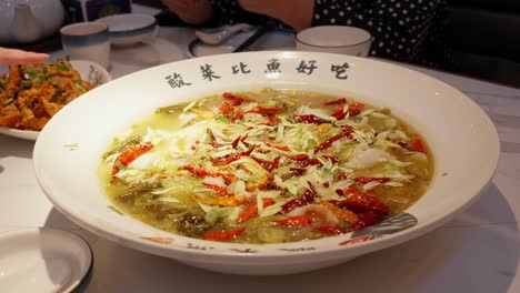 Fish-soup-in-a-bowl,-spicy-and-sour-fish