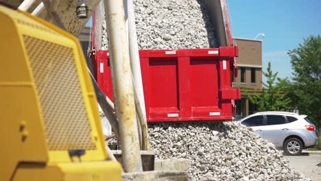 truck-unloads-stone-at-construction-site