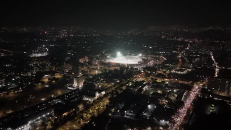 Aerial-view-of-the-illuminated-and-soccer-ready-Estadio-Olímpico-Universitario-at-night