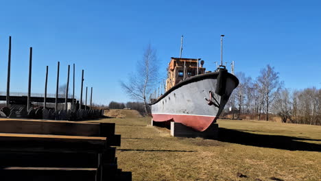 Old-ship-exposition-in-outdoor-museum-on-sunny-spring-day