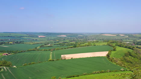 Aerial-wide-flying-over-Butser-Hill-Sunny-day-UK-4K