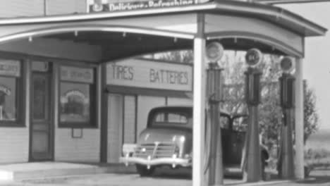 Vintage-Gas-Station-With-Classic-Car-on-a-Sunny-Afternoon-in-1930s