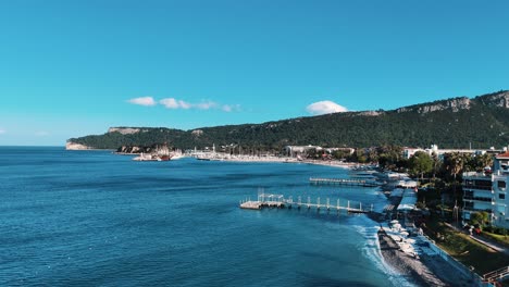 Drone-View-of-Kemer-City-of-Antalya,-Resort-Town-on-Mediterranean-Coast-of-Turkey