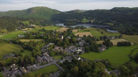 Aerial-view-of-idyllic-town-of-Grasmere-in-The-Lake-District---England,-UK