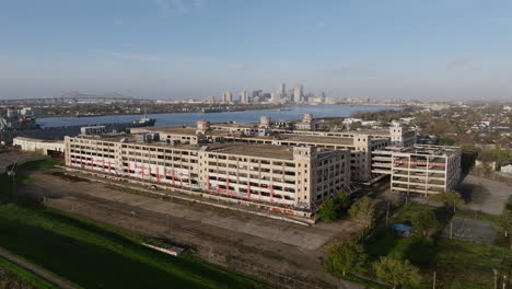 Aerial-flyover-of-an-abandoned-warehouse-outside-of-New-Orleans