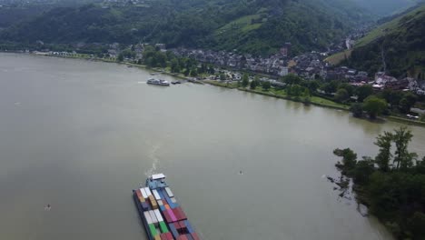 Drone-View-of-Inland-Shipping-on-River-Rhine-Waterway,-Bacharach-Germany