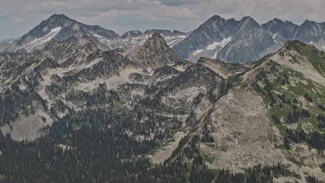 Mt-Revelstoke-BC-Canada-Aerial-v5-zoomed,-high-altitude-drone-flyover-capturing-the-vast-Canadian-wilderness-and-the-towering-peaks-of-mountain-summits---Shot-with-Mavic-3-Pro-Cine---July-2023