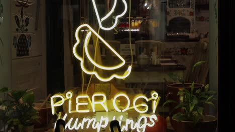 Neon-advertisement-for-pierogi,-a-Polish-culinary-delicacy