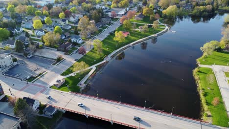 aerial-flyover-of-a-bridge-in-a-suburban-downtown