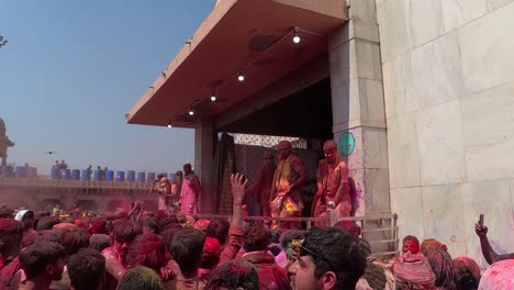 POV-SHOT-Men-are-blowing-paint-from-inside-the-temple-and-making-fun-of-Dhuleti