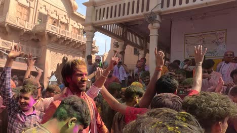 pov-shot-A-lot-of-people-are-dancing-in-the-temple-and-shooting-inside-the-camera