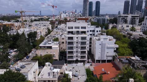 High-crane-working-on-building-construction-on-Bublick-Street,-Tel-Aviv,-Israel