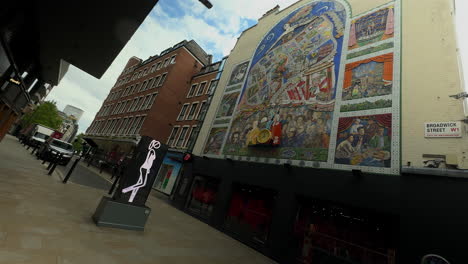 Broadwick-Street-mural-low-angle,-wide-shot,-Sunny-day,-London