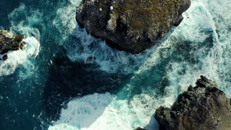 Ocean-water-churns-in-El-Boiler-San-Benedicto-Revillagigedo-Islands-Mexico,-aerial-top-down