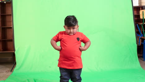 general-shot-of-child-with-green-background