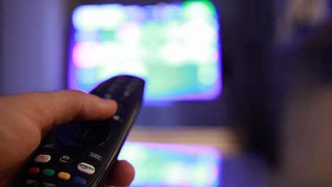 Close-up-shot-of-a-man-utilizing-an-LG-TV-magic-remote