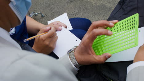 Detail-shot-of-blind-man-using-braille-system