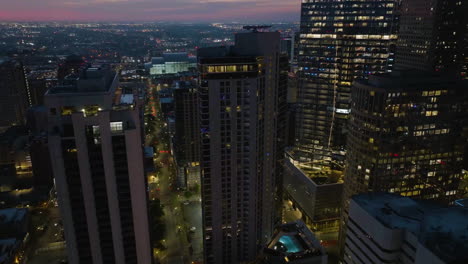 Aerial-view-away-from-the-Market-Square-Tower-and-Brava-Luxury-apartments,-dawn-in-Houston