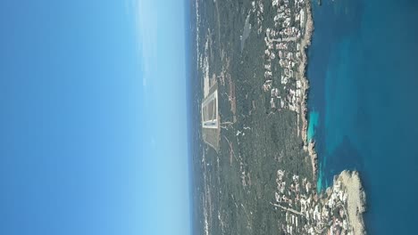 Vertical-shot-Pilot-POV-real-time-approach-to-Menorca-airport,-Spain