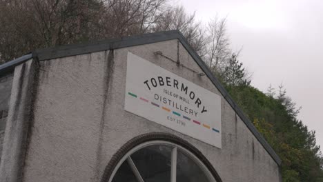 Hand-held-shot-of-the-Tobermory-distillery-on-the-Isle-of-Mull