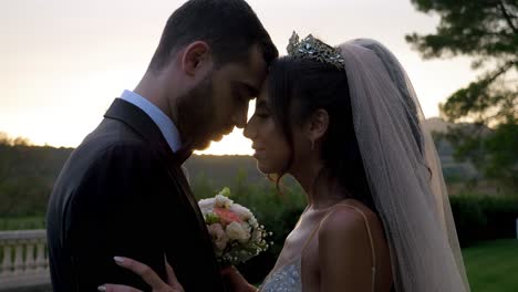 Slow-motion-shot-of-a-couple-resting-their-foreheads-on-each-other-having-a-moment