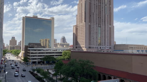 Downtown-traffic-in-San-Antonio,-Texas-at-the-Henry-B-Gonzalez-convention-center---Handheld