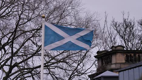 Scottish-flag-flying-outside-Edinburgh-Castle,-Edinburgh,-Scotland