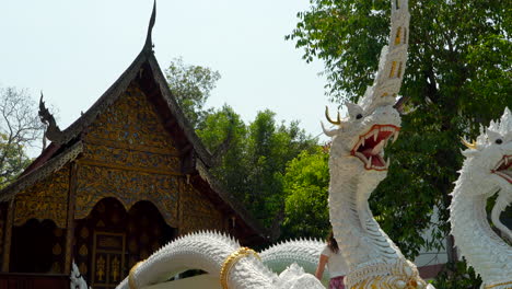 European-tourist-visiting-Thai-traditional-temple-in-Chiang-Mai