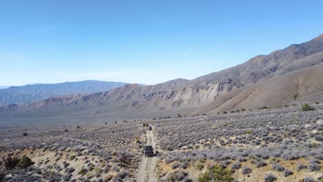 Offroad-Driving-Through-Arid-Landscape-In-Death-Valley-National-Park,-Mojave-Desert,-California