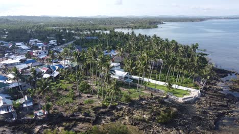 Poor-and-Rich-Housing-Contrast,-Seaside-Luxury-Home-next-to-Shacks-Settlement,-Drone-View