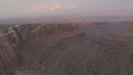 Aerial-scene-above-the-vast-canyons-of-the-Moab-desert-during-sunset