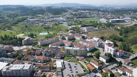 Drone-shot-of-urban-landscape-in-Paços-de-Ferreira,-Portugal,-with-mixed-developments