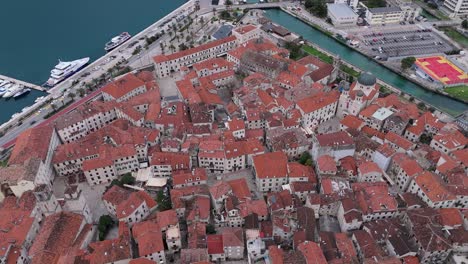 4K-drone-footage-captures-the-UNESCO-listed-Kotor-Old-Town-and-port-in-the-Bay-of-Kotor,-Montenegro