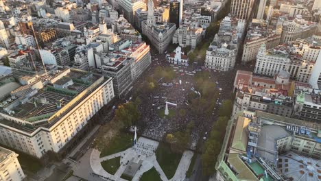 Crowd-of-Argentinian-Young-Protester-on-Plaza-de-Mayo-in-Buenos-Aires-at-golden-hour