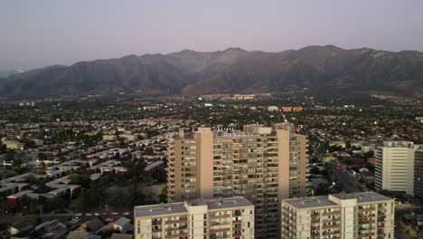 buildings-and-house-with-views-of-the-Andes-mountain-range-in-the-commune-of-Santiago,-country-of-Chile