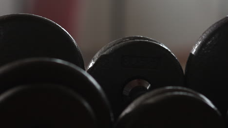 handheld-shot-of-gym-weights