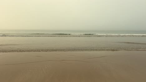 Static-view-of-the-calm-sea-from-the-beach-on-a-misty-day