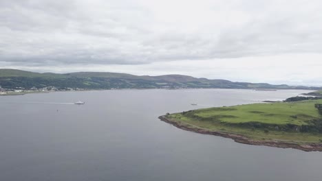 Aerial-Push-In-Two-Ferrys-In-Ocean-Islands-Surrounding