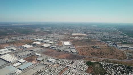 Breathtaking-bird's-eye-view-of-Reynosa,-a-beautiful-and-modern-city-in-Tamaulipas,-Mexico,-showcasing-its-urban-landscape-and-vibrant-atmosphere