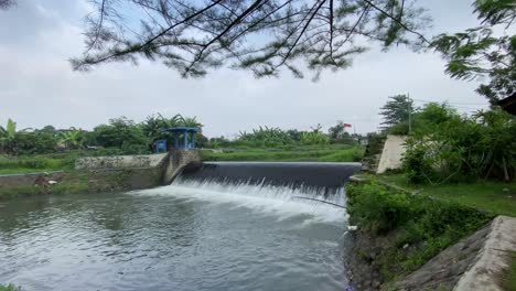 During-the-day-a-river-dam-in-Yogyakarta,-Indonesia