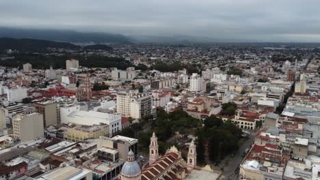 Aerial-view-of-overcast-flat-light-skyline,-central-plaza-in-Salta-ARG