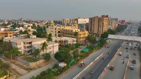 Karachi-famous-Shaheed-e-Millat-road-expressway-street-view-and-buildings,-Sindh,-Pakistan