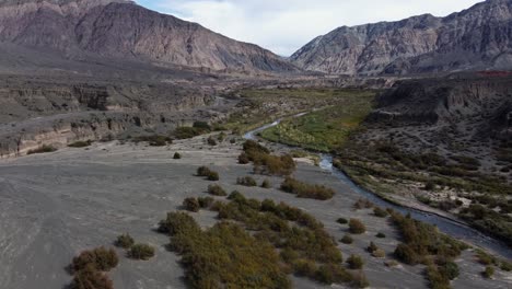 Aerial-view-of-Rio-Jachal-valley-in-high-Andes-Mountains-alpine-rock