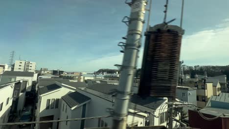 Building-Structures-View-From-A-Moving-Bullet-Train-Between-Kyoto-And-Tokyo-In-Japan