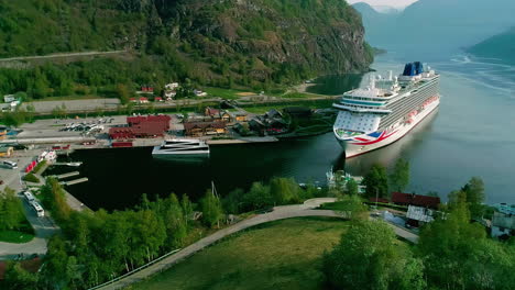 Timelapse,-Ferry-Boat-and-Cruise-Ship-in-Port-of-Scenic-Flam-Village,-Aurland-Fjord,-Norway